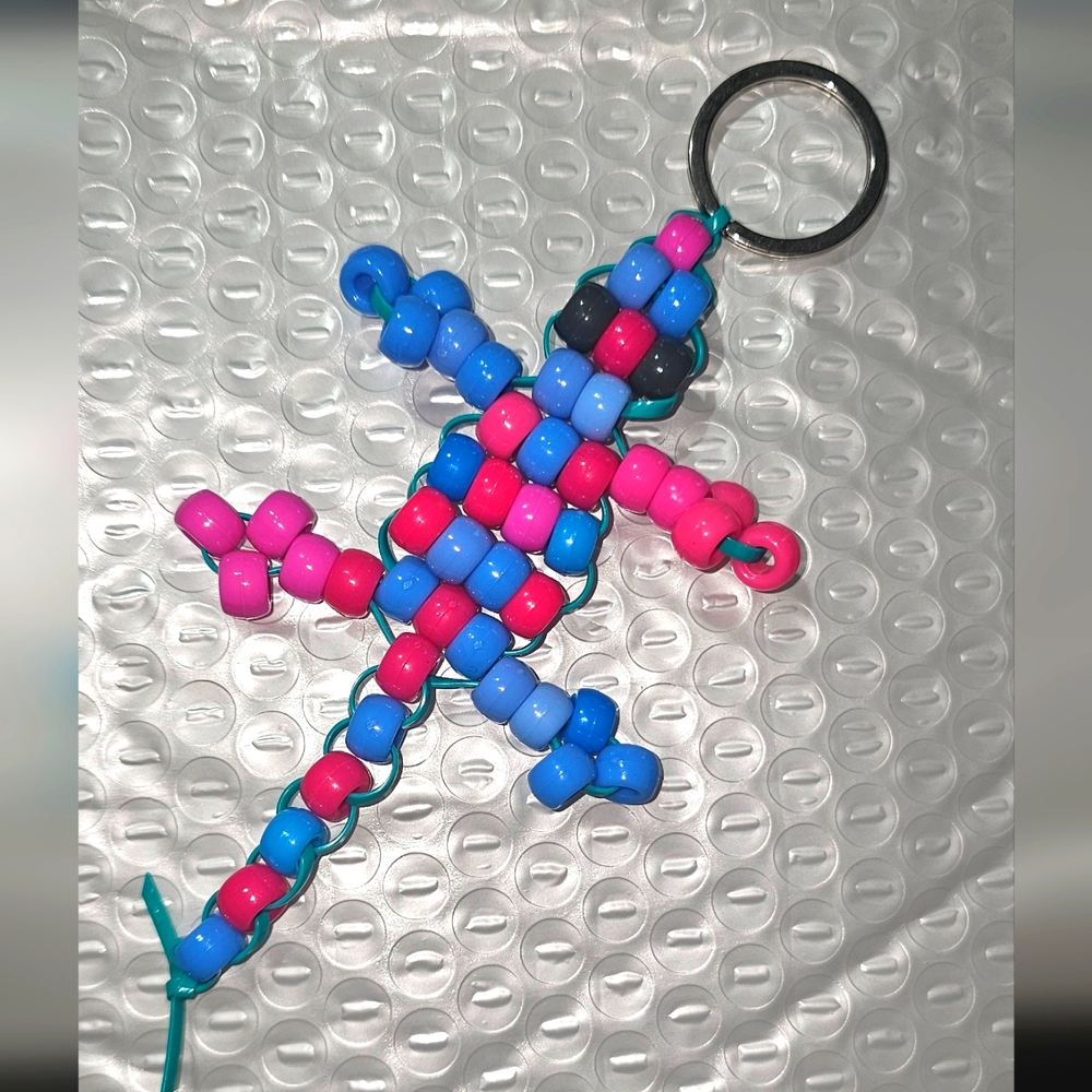 Custom keychain. All earnings will be donated to the FaerieLand Rescue.